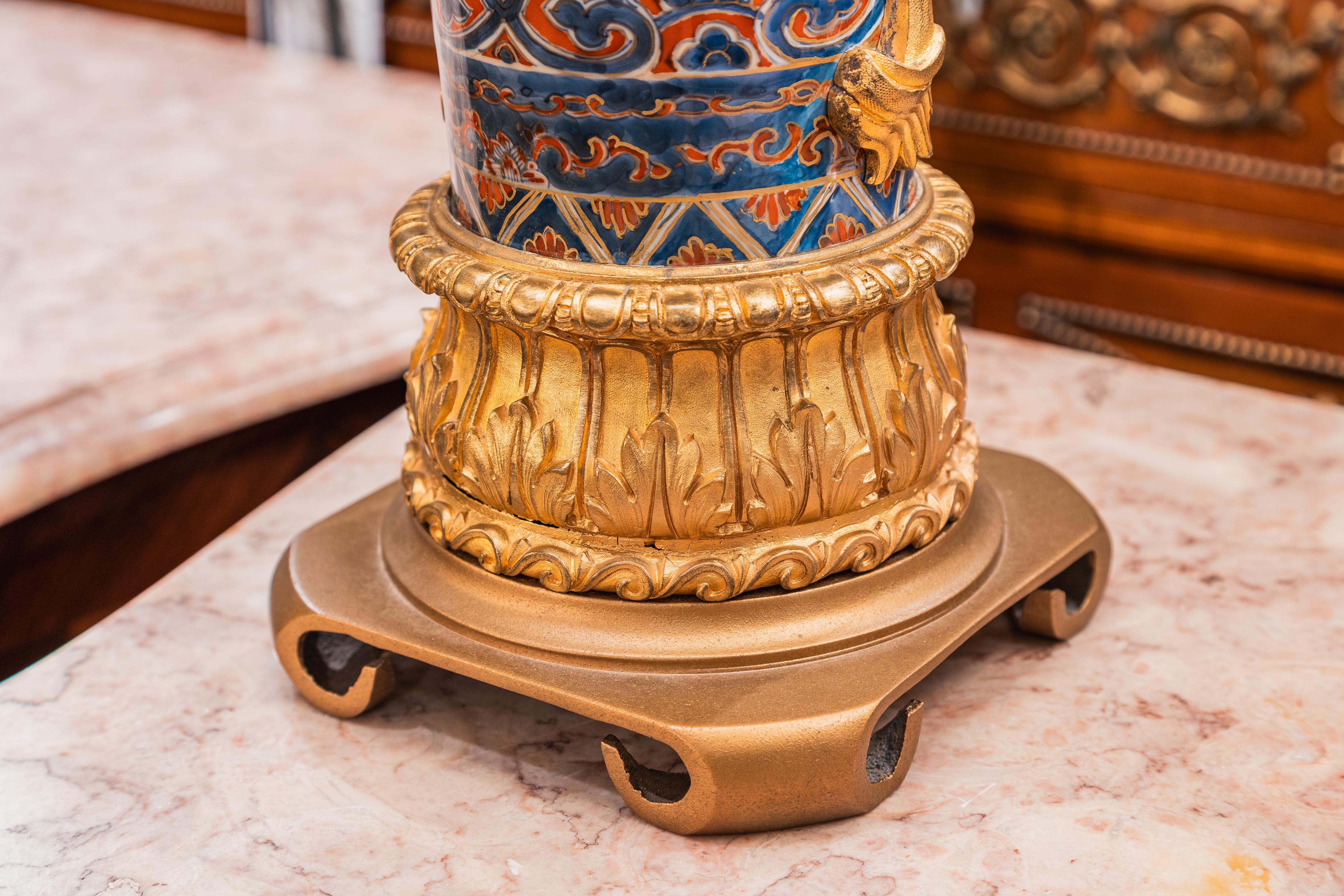 A fine pair of 19th century French Louis XV Japanese water bottles with gilt bronze mounts made into lamps 