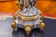 A fine pair of large 19th c Classical figural silver dore and gilt bronze lamps