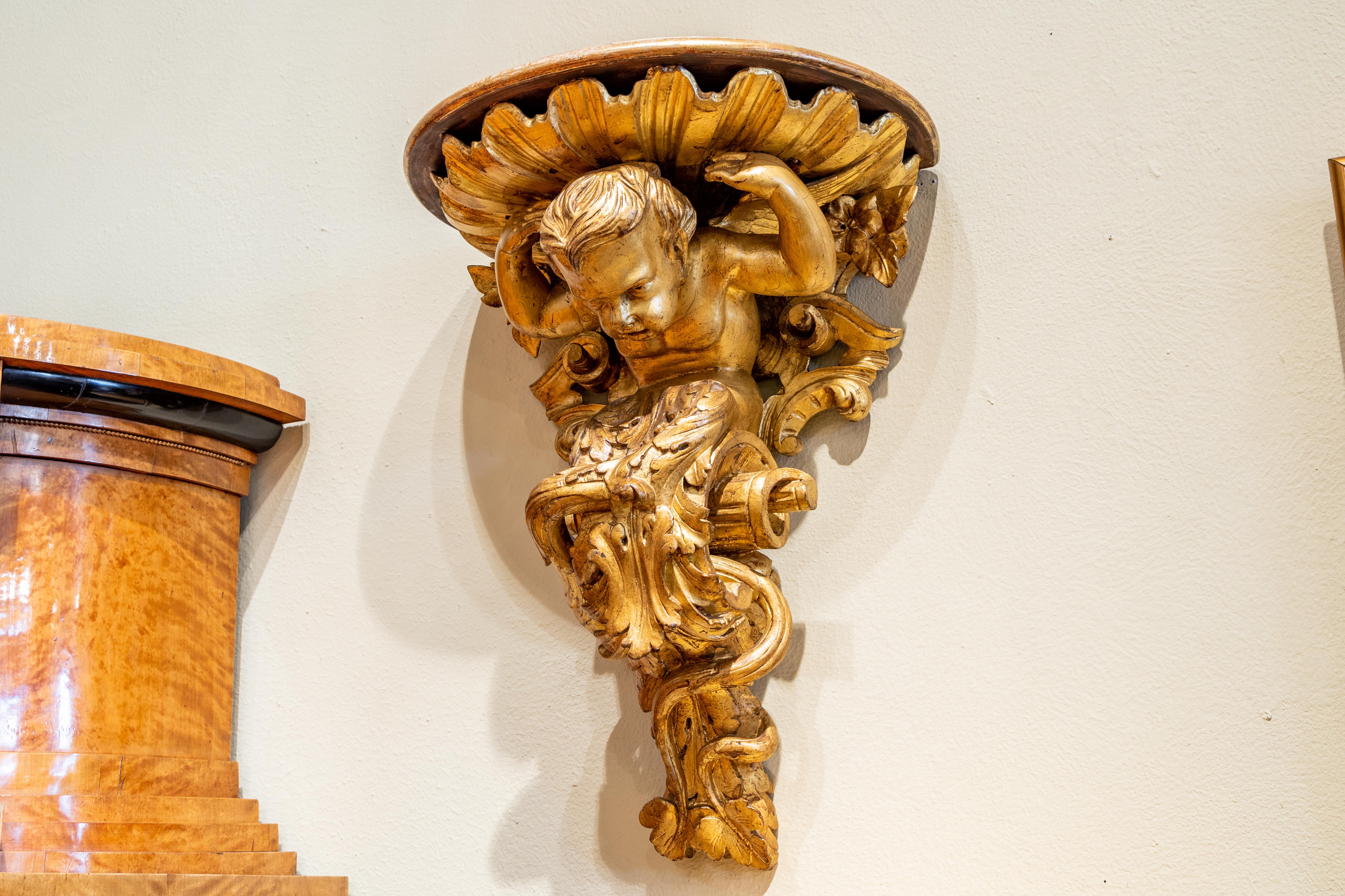 Renaissance Fine Pair of Large 19th C Italian Carved and Gilt Wall Brackets with a Cherub For Sale