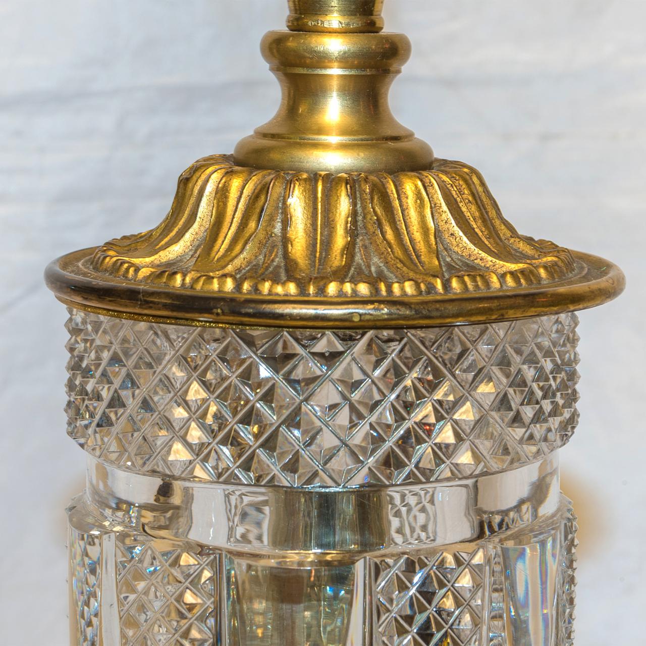 Each of fine cut crystal, cut in the Baccarat diamond design with bronze fittings, raised on round crystal plinth.

Date: 19th century
Origin: French
Dimension: 37 inches high