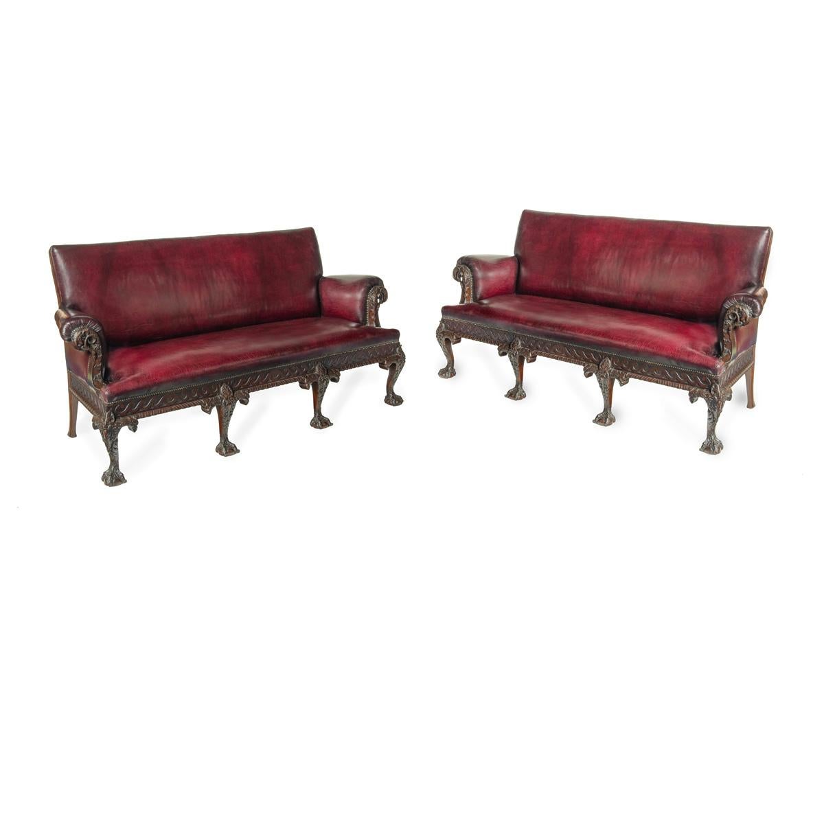 A fine pair of large late Victorian mahogany eagle sofas For Sale 1