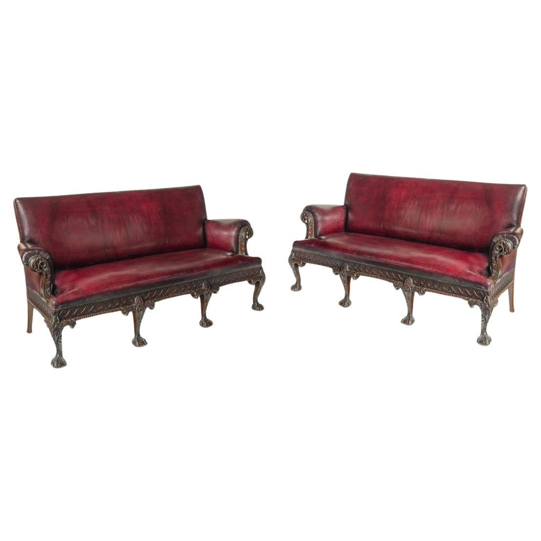 A fine pair of large late Victorian mahogany eagle sofas For Sale