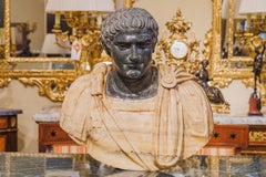 A fine pair of late 19th century Alabaster and marble Roman dignitary busts