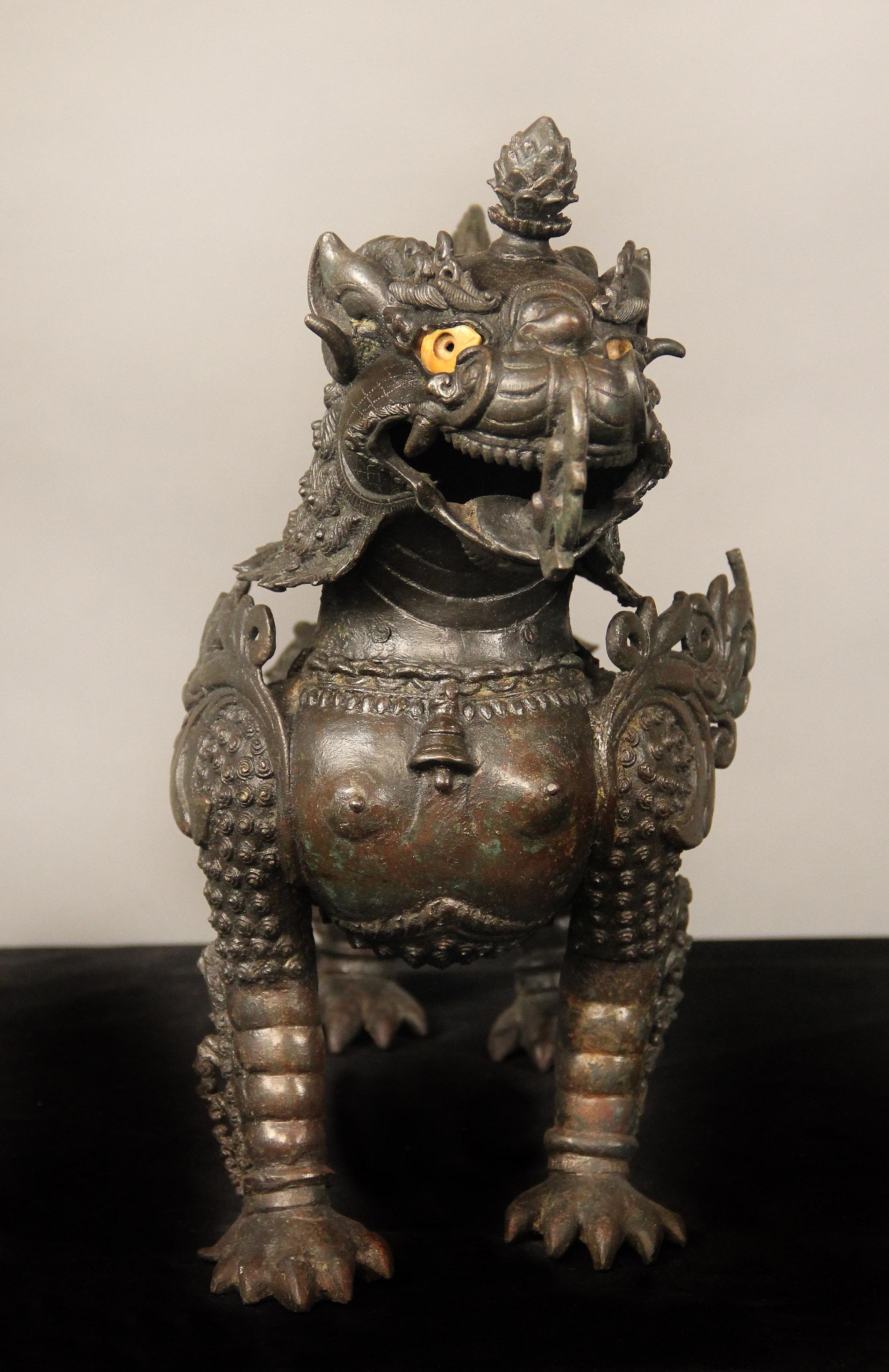 Belle Époque Fine Pair of Late 19th-Early 20th Century Chinese Iron Foo Dog Dragons