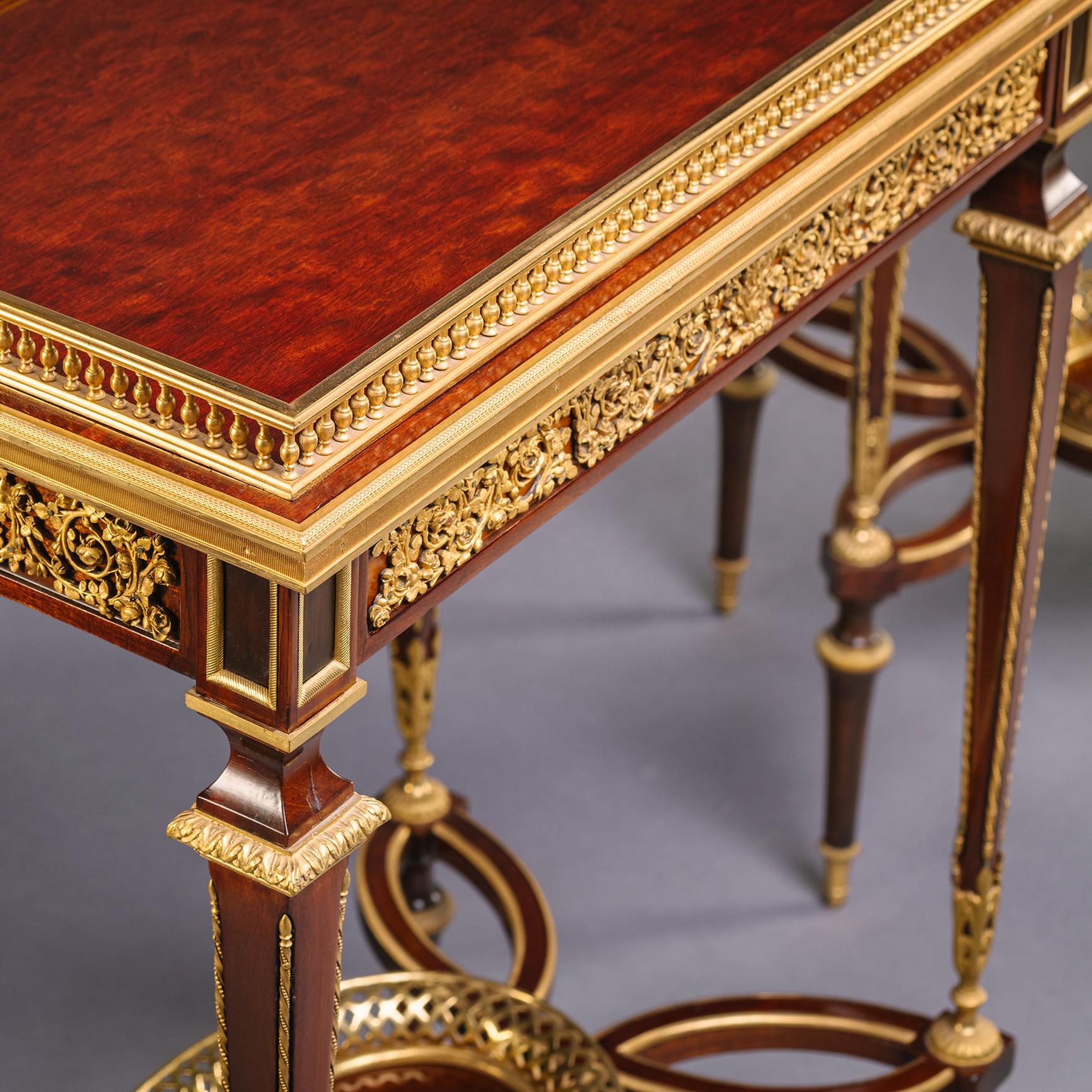 French A Fine Pair of Louis XVI Style Gilt-Bronze Mounted Mahogany Occasional Tables For Sale