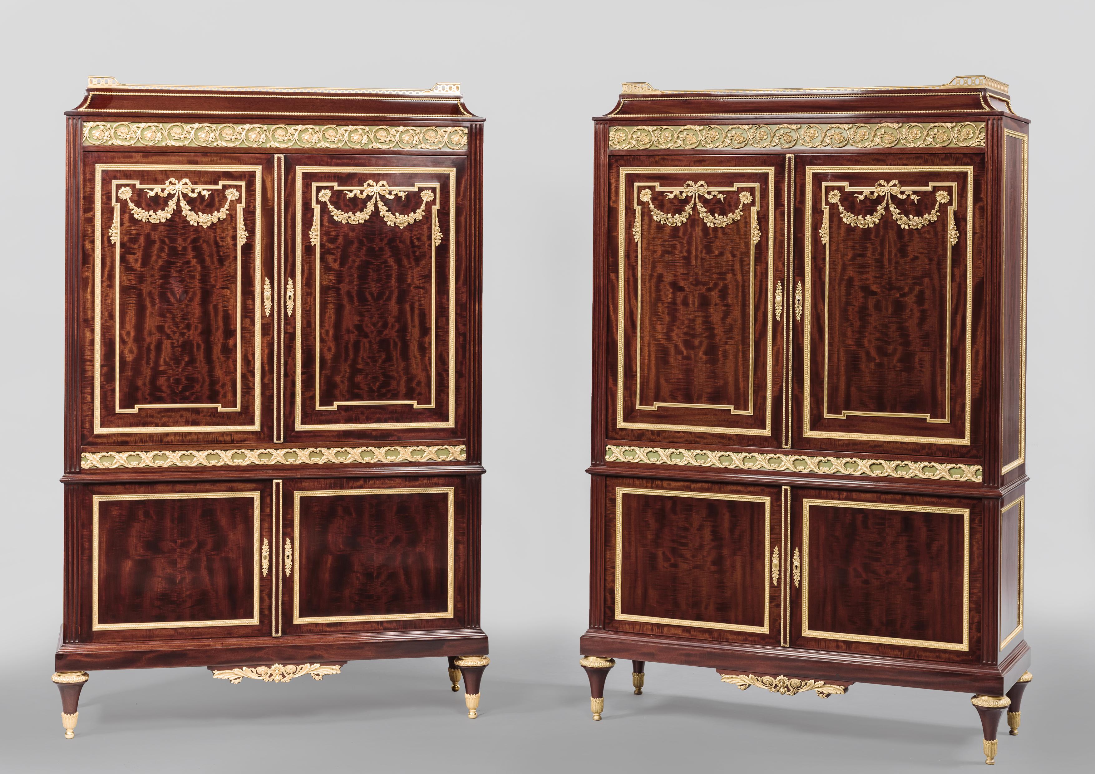 A fine Pair of Louis XVI Style Gilt Bronze Mounted Mahogany Cabinets by Paul Sormani. 

Paris, circa 1870.

Signed to the lockplates 'P. Sormani', 10 rue Charlot à Paris'. 

This important pair of cabinets are veneered in a rich flame mahogany