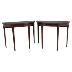 A fine pair of mahogany console tables