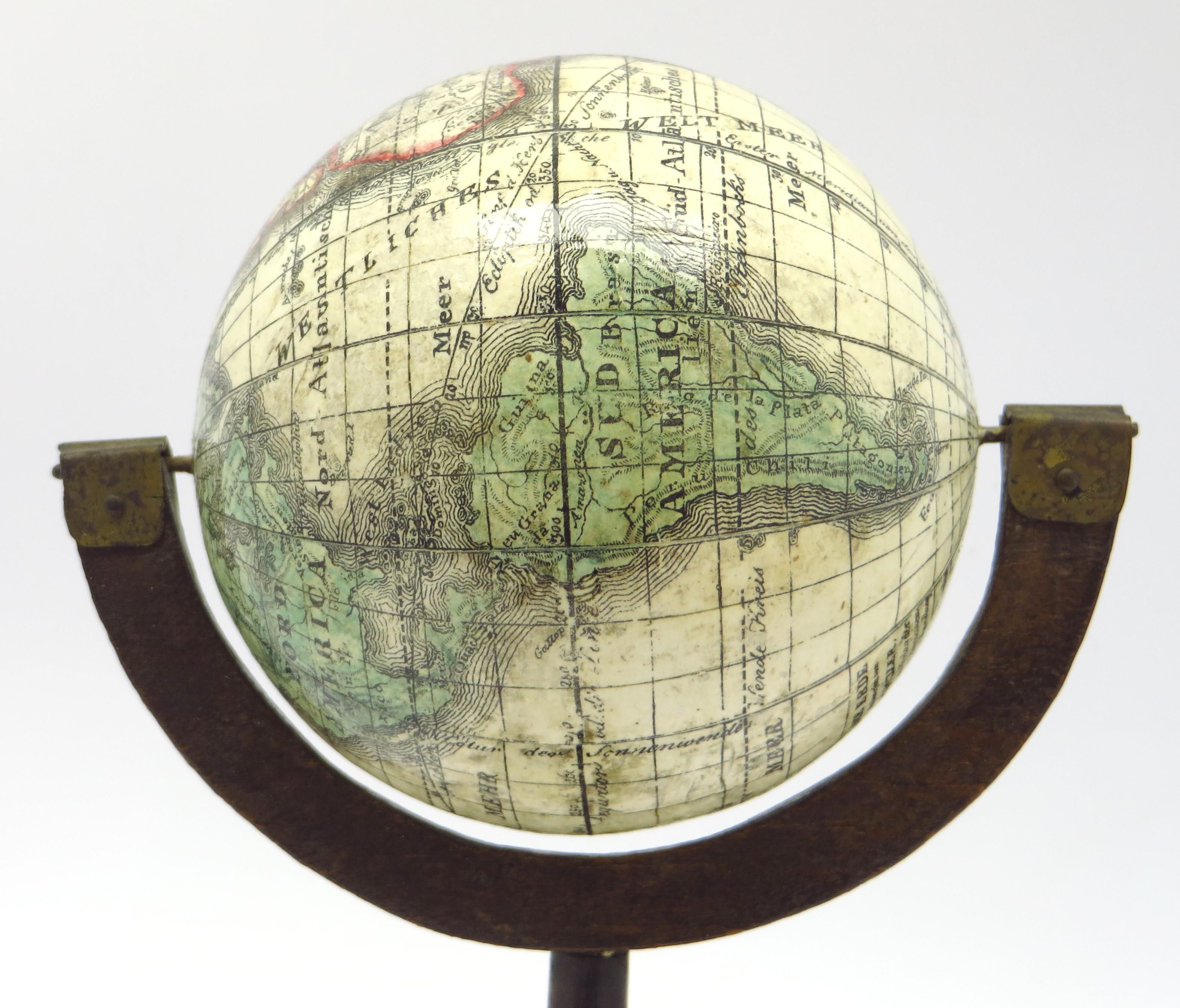 German A fine pair of miniature globes on stands For Sale