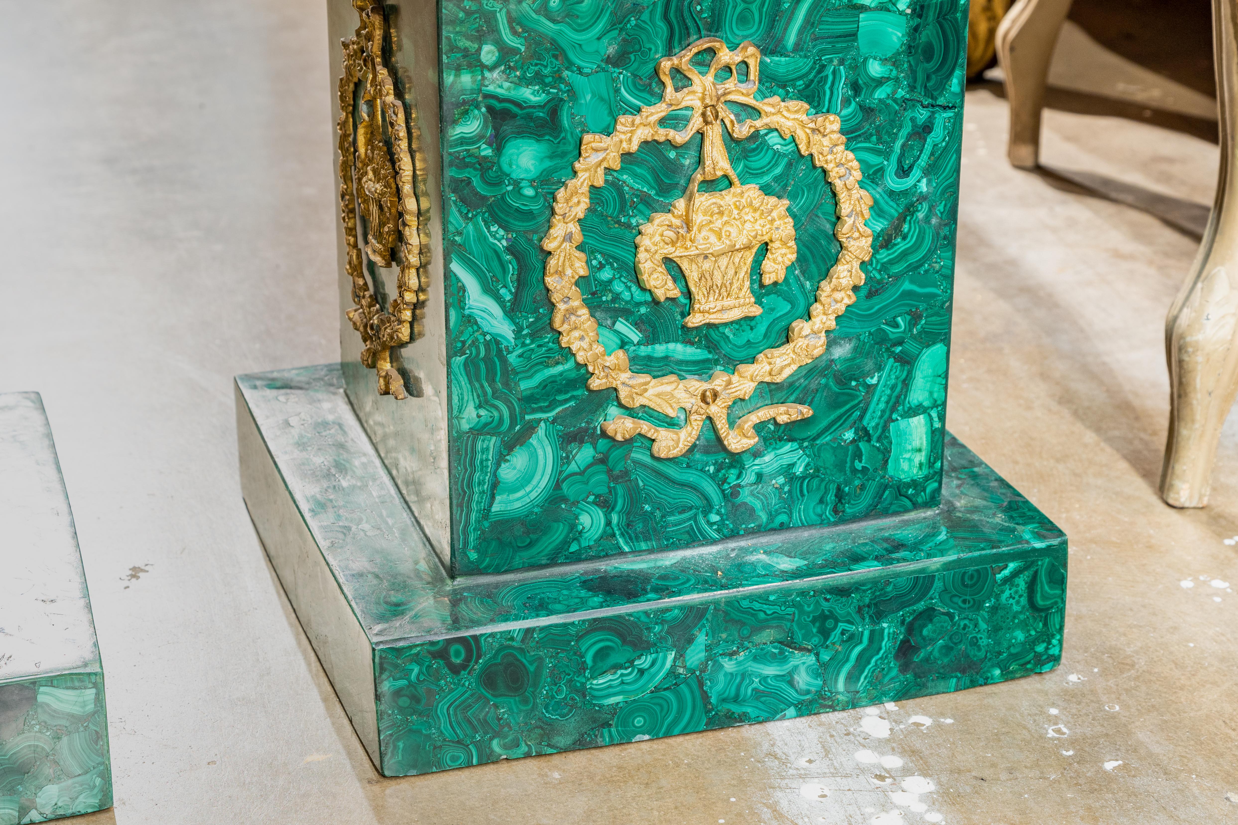 A fine pair of Classical palace size French malachite floor obelisks with gilt bronze mounts.