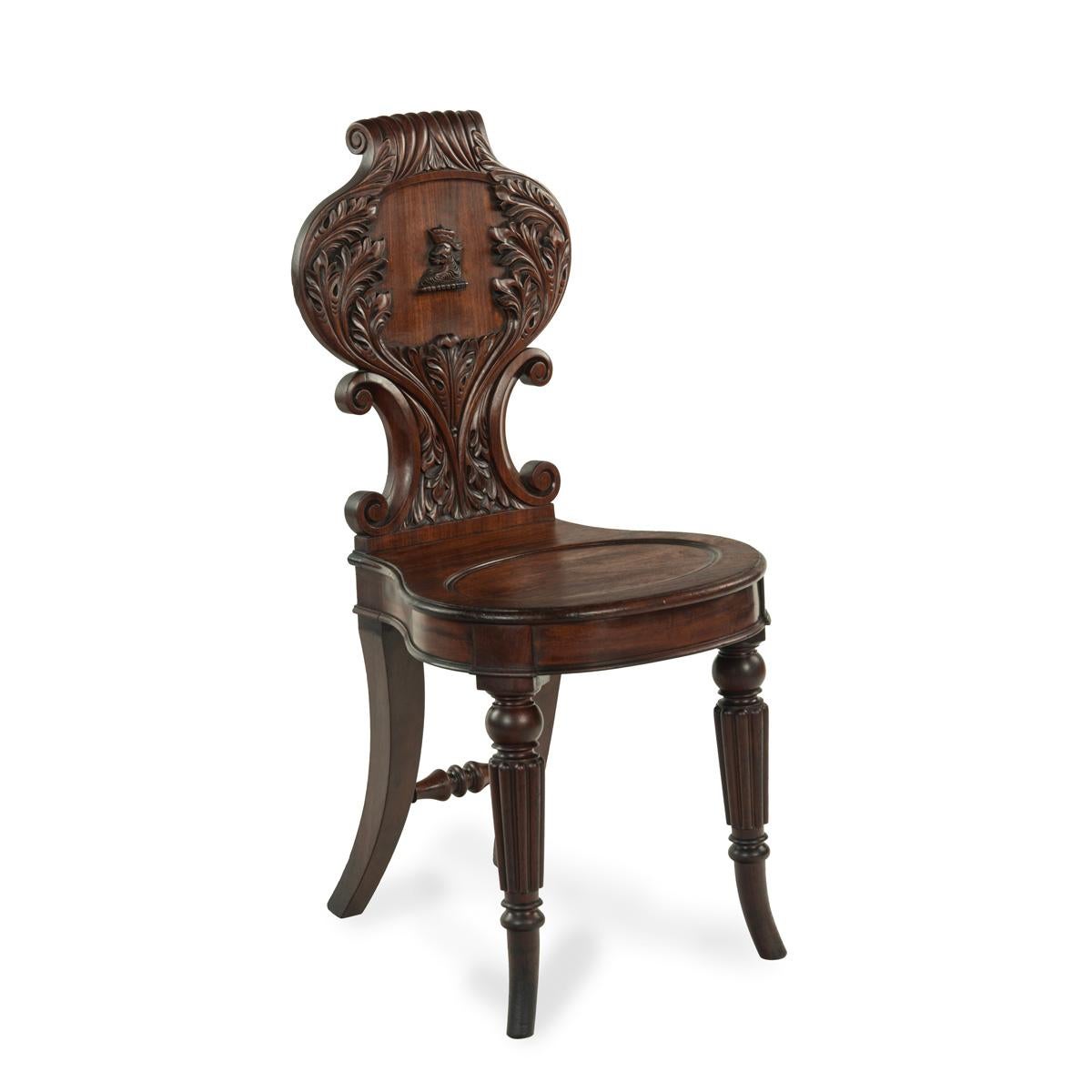 Early 19th Century A fine pair of Regency mahogany armorial hall chairs attributed Gillows For Sale