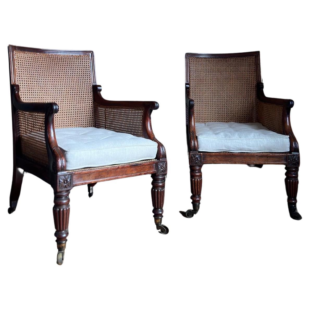 A fine pair of regency mahogany bergere library armchairs, c.1815 For Sale