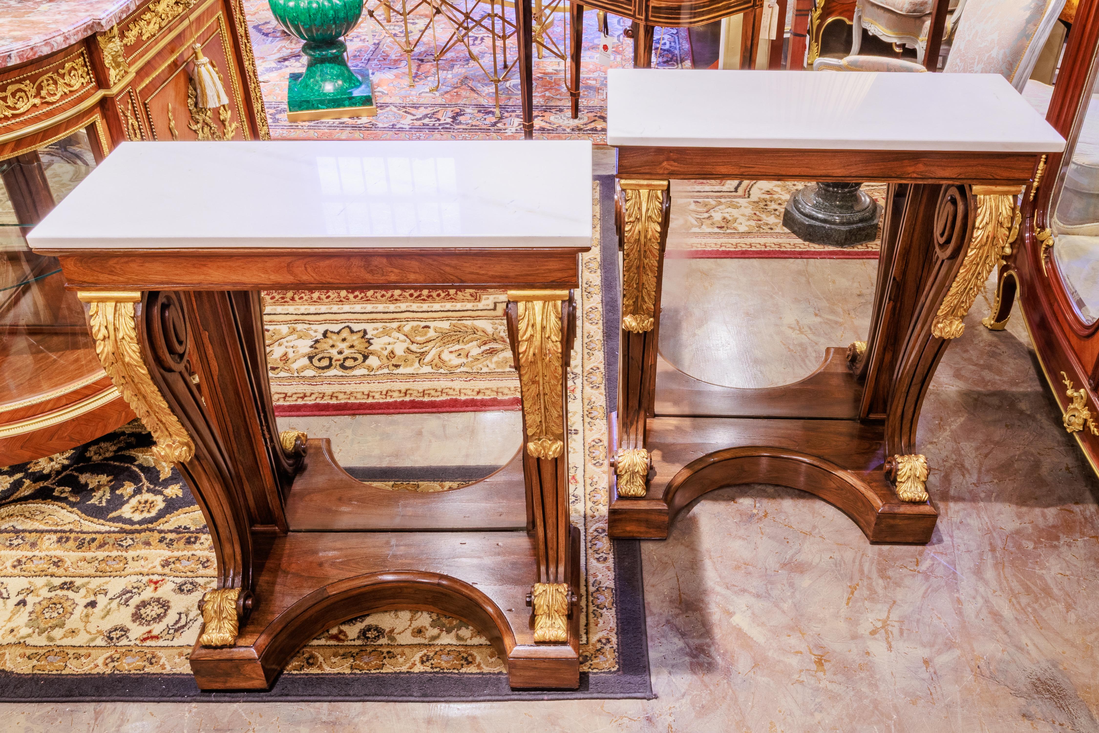 Gilt A fine pair of Regency rosewood and parcel gilt console tables For Sale