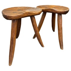 A fine pair of saddle seats oak stools