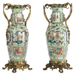 Antique A fine pair of unusual ormolu mounted Chinese porcelain vases