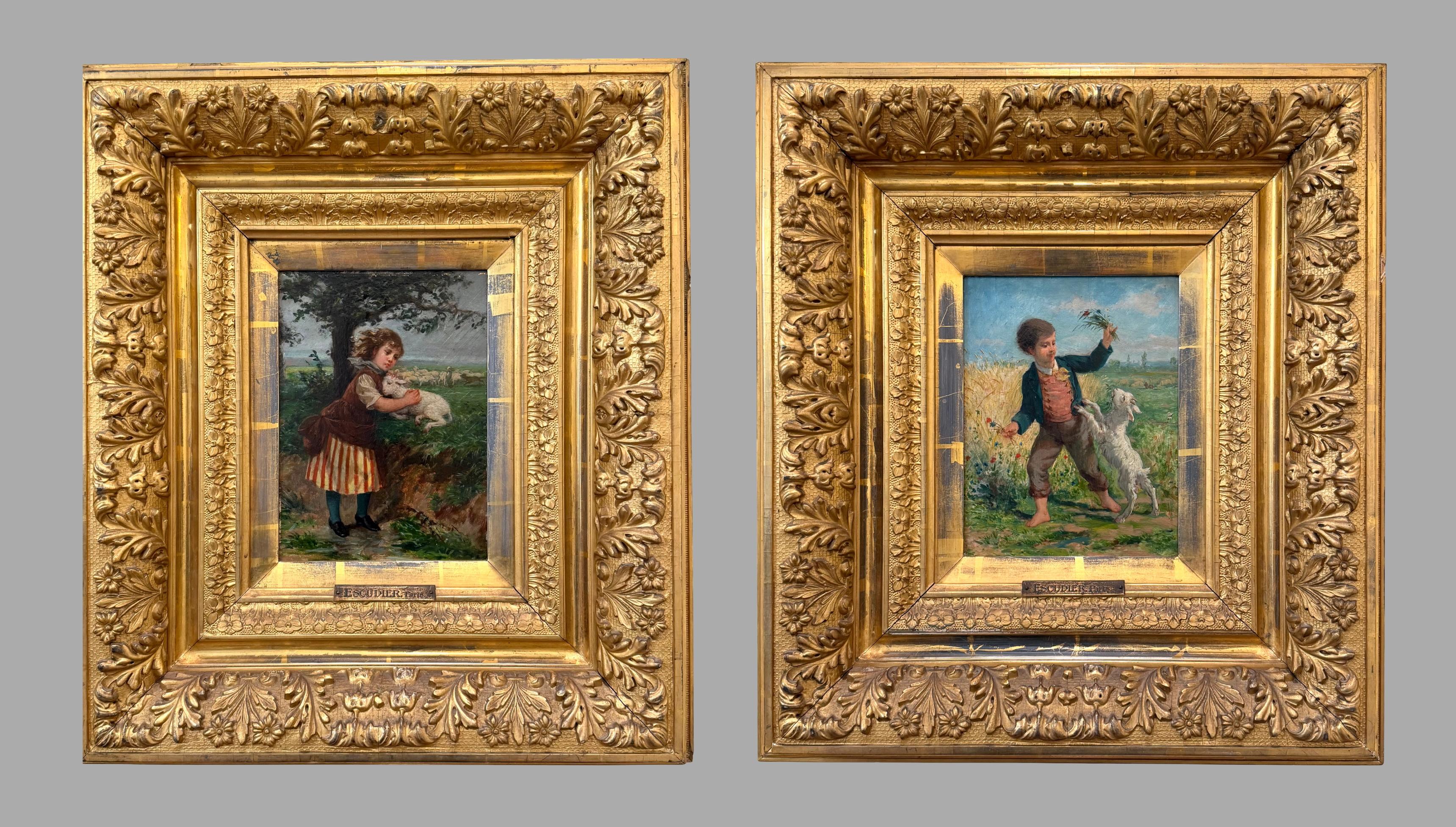 Charles Jean Auguste Escudier, French (1848-1923): A charming pair of oil on wood panel paintings by Escudier, one depicting a young girl coddling a lamb in a bucolic setting, the companion depicting a well-dressed young boy holding a bouquet of