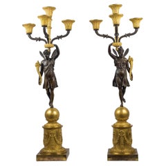 Fine Patinated and Gilt Bronze Four-Light Candelabras