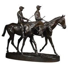 Grupo deportivo de bronce patinado, de Emmanuel Fremiet, hacia 1910