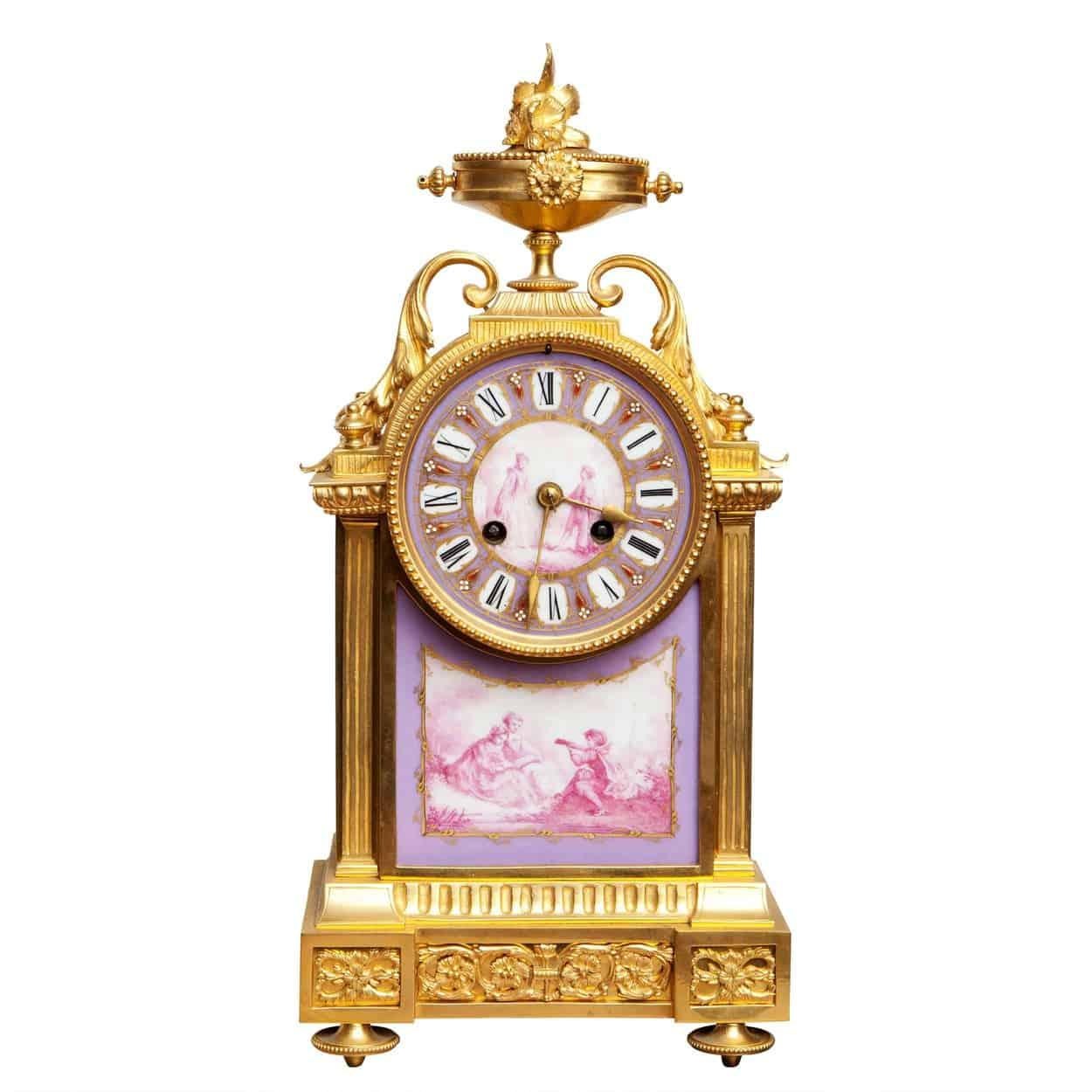 France, circa 1880

The ormolu case mounted with fine painted porcelain scenes of a courting couple. This unusual mauve colour pallet emphasizes the quality and cleanliness of the clock.

Strikes every half hour and hour.  

Measures: Height