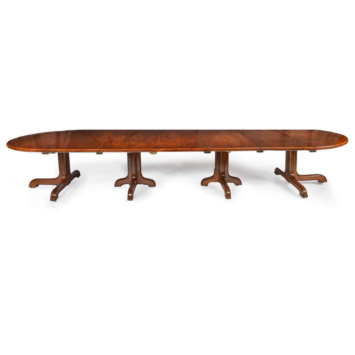 A Fine Quality and Large Four Pillar Brown Oak Extending Dining Table, c.1900, This fine extending dining table has four pillars and, with the replacement extending leaves added, can comfortably seat a family plus guests for dinner. Seating 10