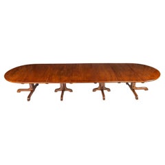 A Fine Quality and Large Four Pillar Brown Oak Extending Dining Table, c.1900