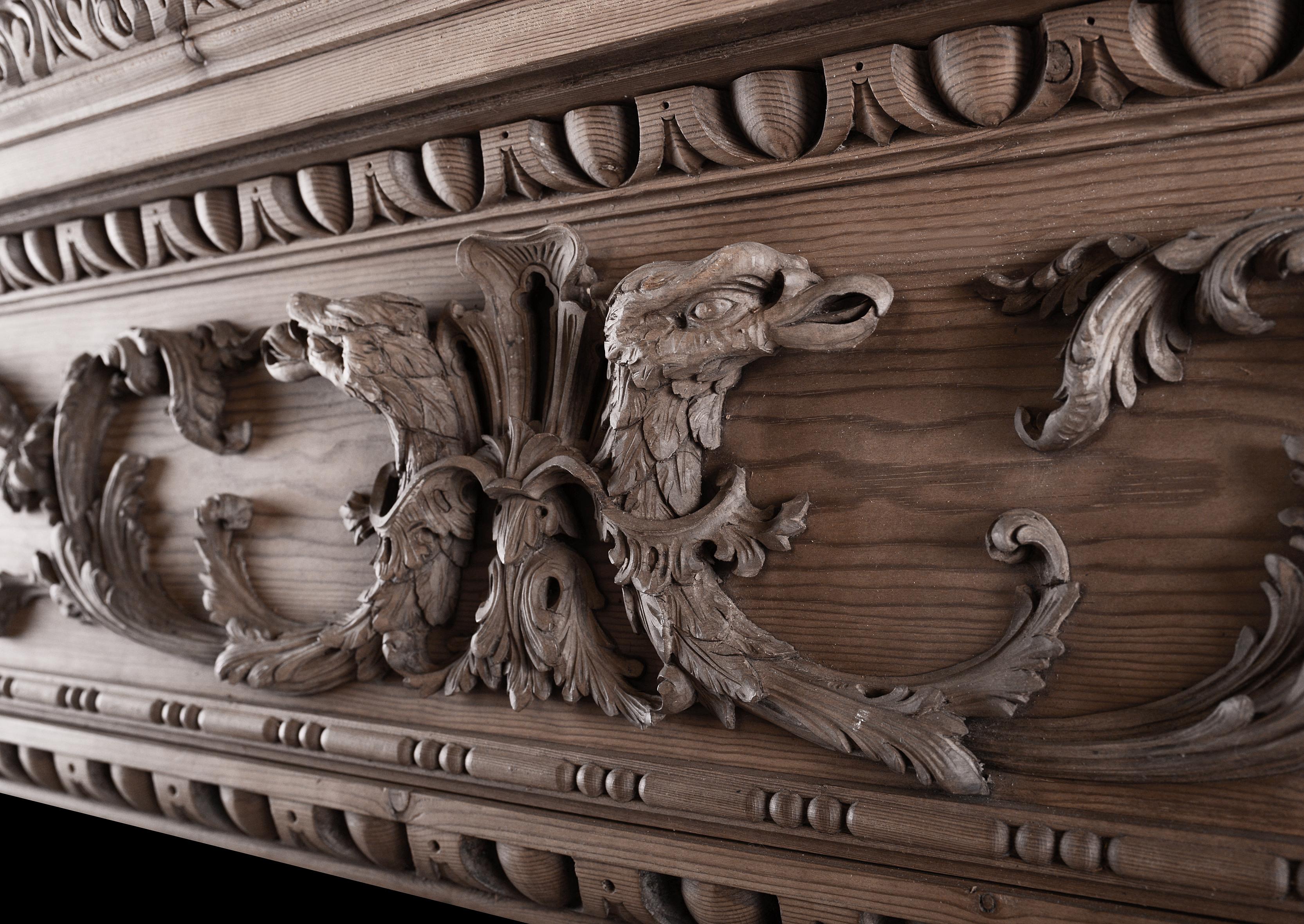 English A Mid Georgian Style Carved Pine Fireplace