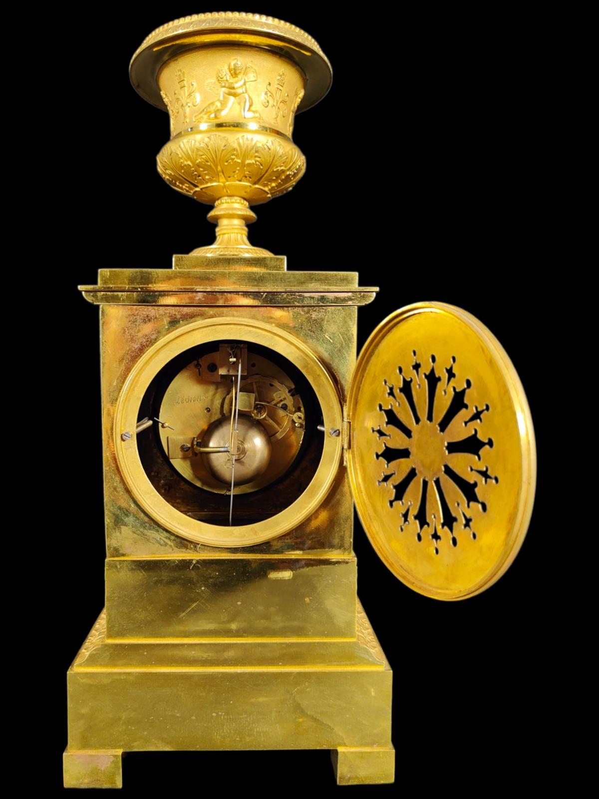 A fine quality French Empire clock by the eminent maker Ledieur, signed on the backplate of the movement.. The movement is an 8 day bell striking silk suspended movement and is also engraved Ledieur on the backplate of the movement. Circa