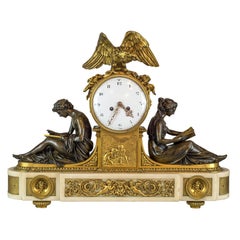 Reloj de chimenea francés de bronce patinado y dorado de gran calidad