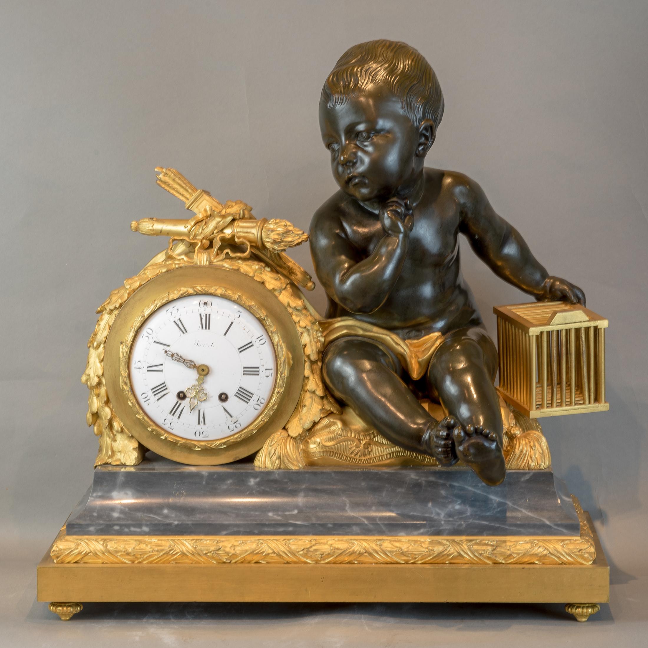 The mantel clock with a seated putto and birdcage. 

Maker: Alfred-Emmanuel Beurdeley (French, 1847-1919)
Origin: French
Date: 19th century
Dimension: 26 in. x 13 1/2 in.