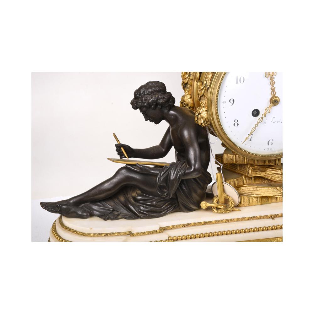 The gilt ormolu eagle pediment, over two patinated bronze figures flanking a circular clock resting on five books, dial with Arabic numbers and gilt hands, signed but partially illegible, elongated stepped oval white marble base with center frieze,
