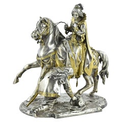 Antique A fine quality parcel gilt silver plated sculptural group