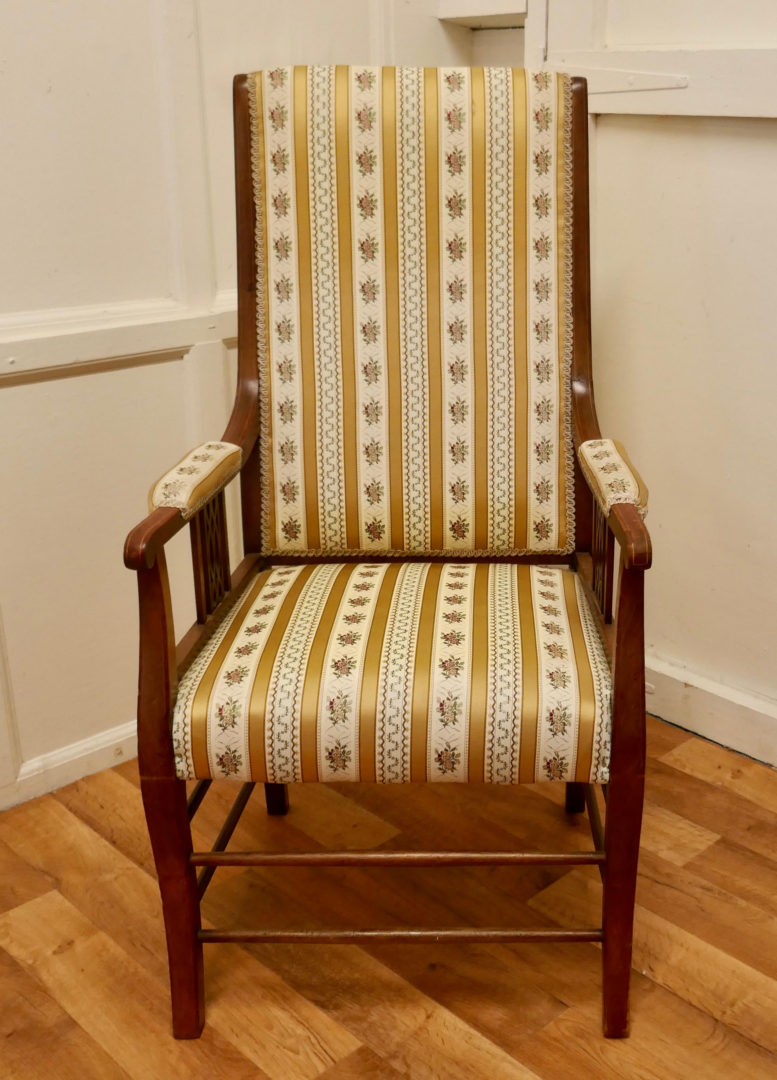 A fine quality regency style high back upholstered arm chair

This is a superbly comfortable Edwardian Walnut arm chair, it has a straight deep back, the chair is upholstered in a dainty regency stripe fabric
The chair has a polished frame, the