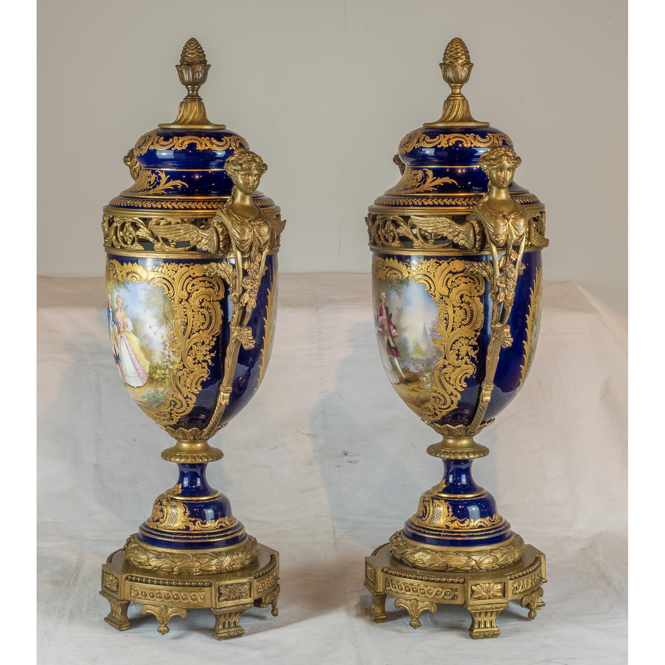 An exquisite Sèvres style bronze mounted and cobalt porcelain with hand painted courting figures in landscapes. 

Origin: French
Date: 19th century
Dimension: 29 in. x 13 in.
