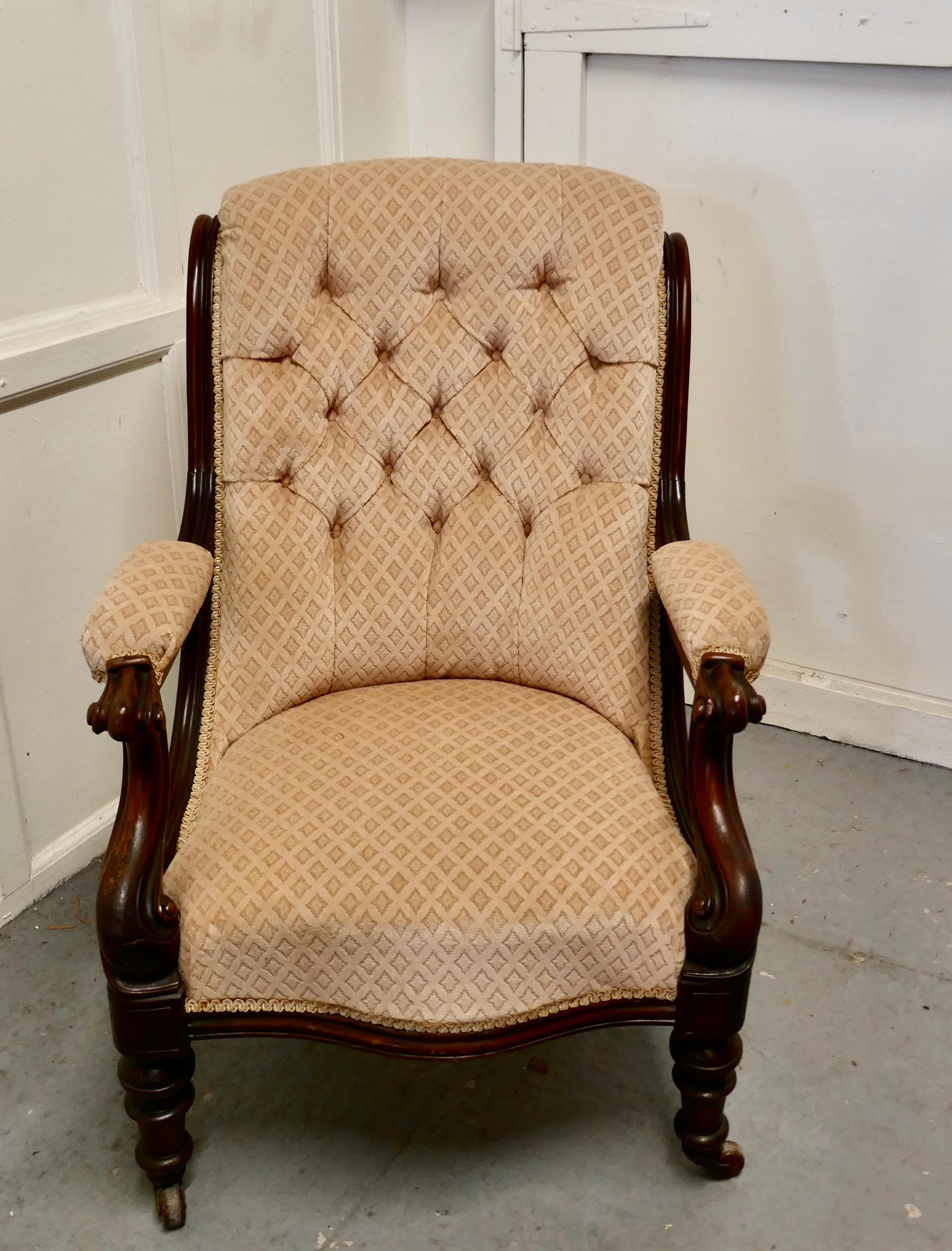 A fine quality William IV mahogany button back chair

 This is a superbly comfortable arm chair, it has a curved deeply buttoned back, the chair is upholstered in a sculptured velvet, it has a mahogany frame, the front legs are turned and the arm