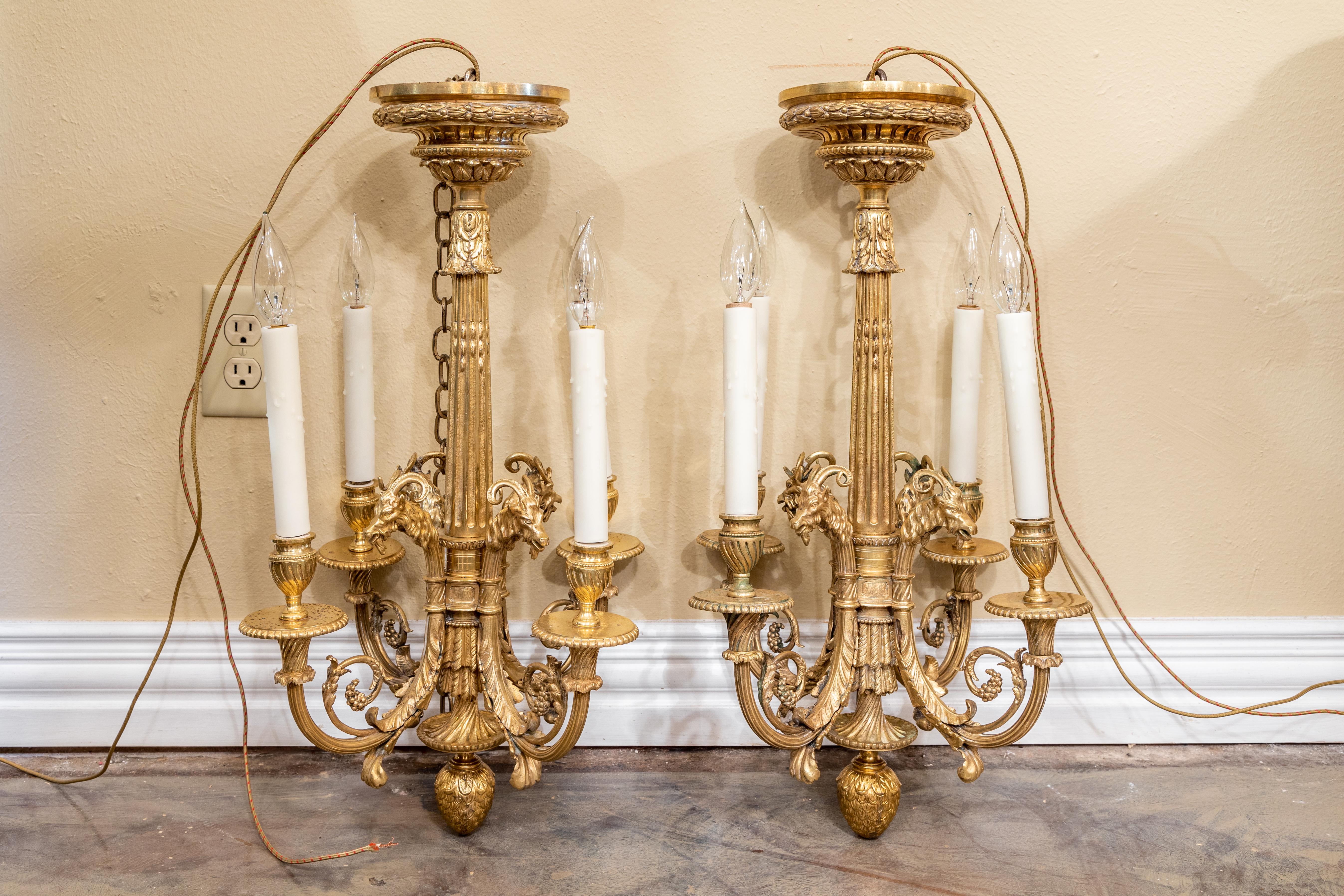 French Fine Rare Pair of 19th C Louis XVI Gilt Bronze Chandeliers, Rams Head Design For Sale