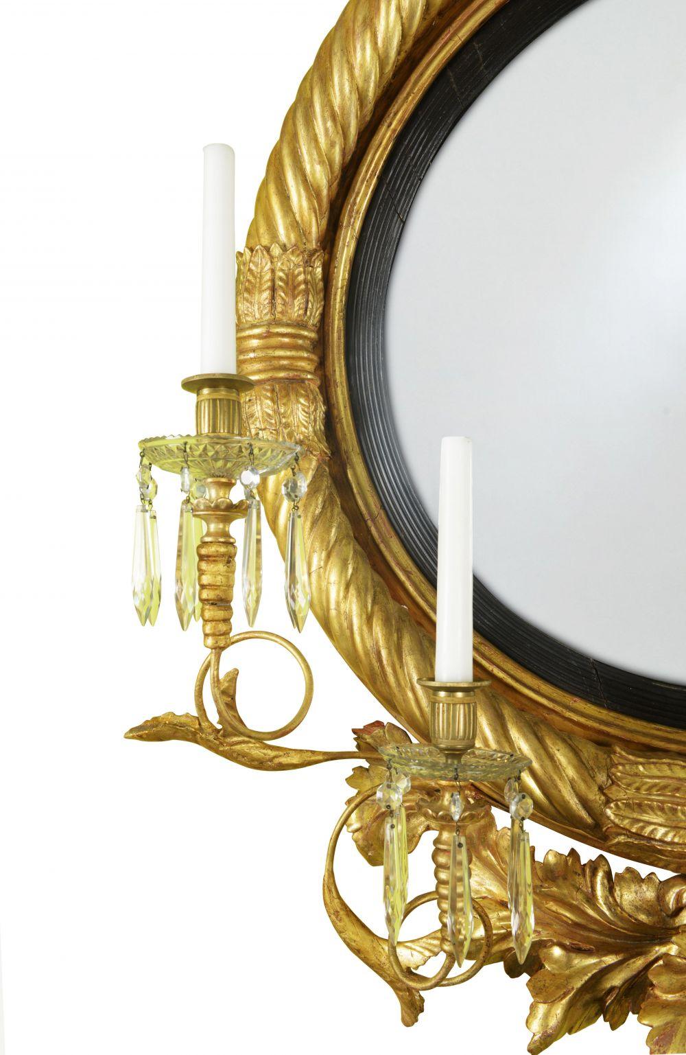 A Fine Regency Giltwood and Ebonised Girandole Mirror In Good Condition For Sale In New York, NY