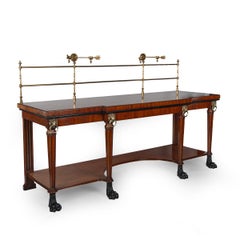 A fine Regency mahogany breakfront serving table after designs of George Smith