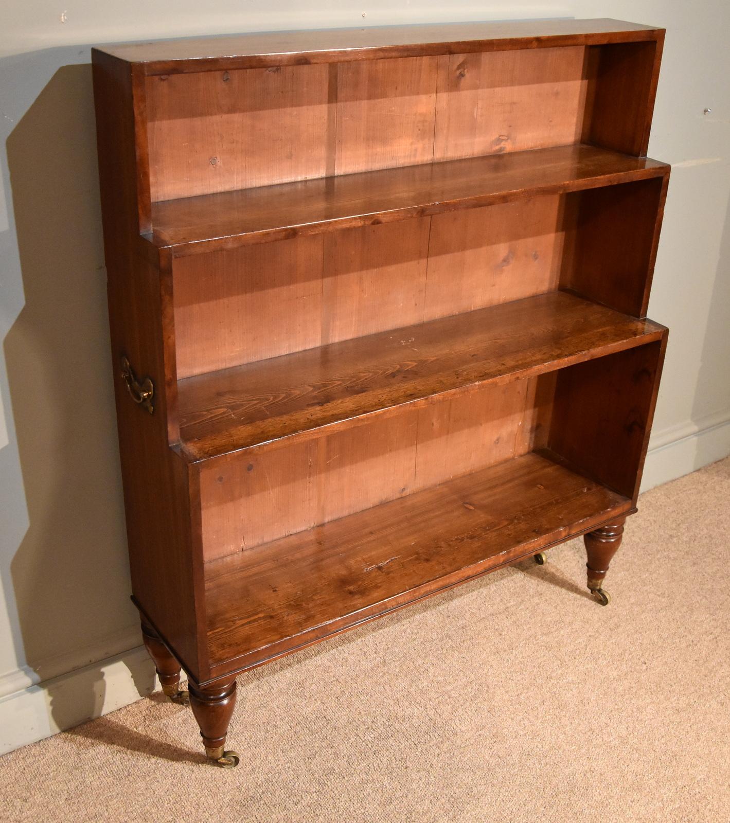 A fine regency period campaign waterfall bookcase. The legs unscrew for transportation

Measures: Height 42.5
