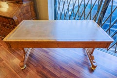 A fine Regency period satinwood and leather top writing desk . Parcel gilt