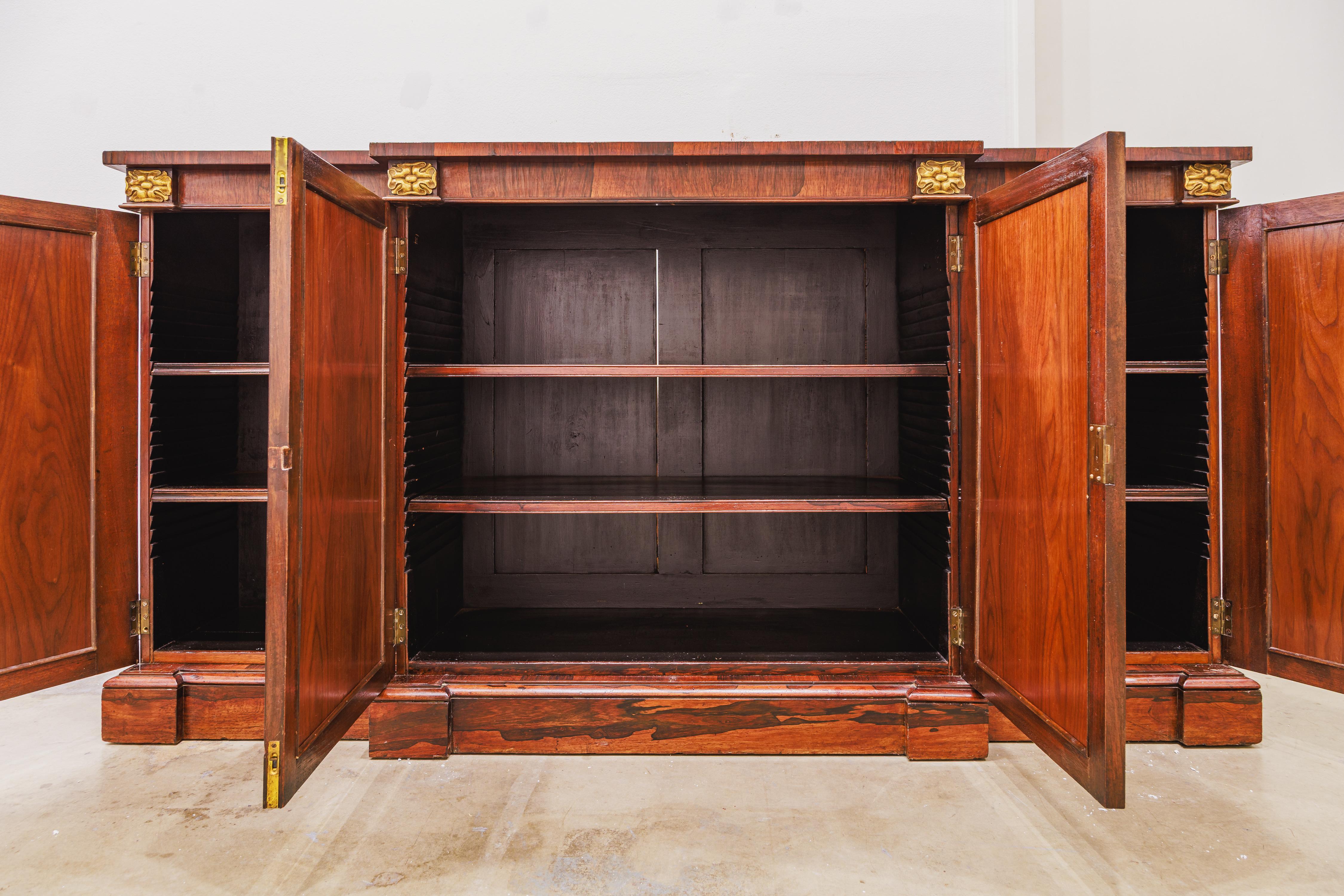 A fine 19th century Regency Rosewood and parcel gilt credenza
