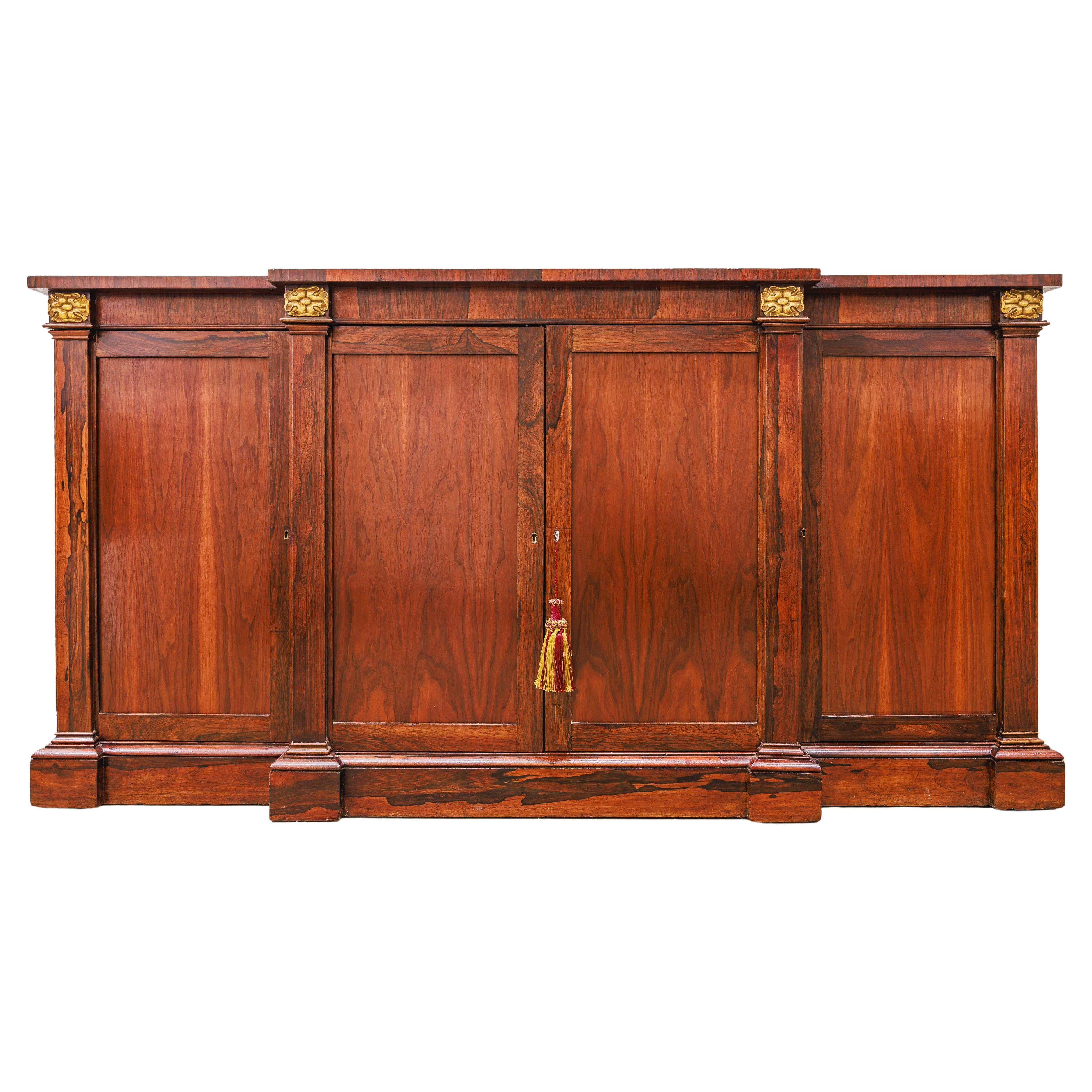 A fine  Regency rosewood and parcel gilt cabinet For Sale