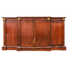 A fine  Regency rosewood and parcel gilt cabinet