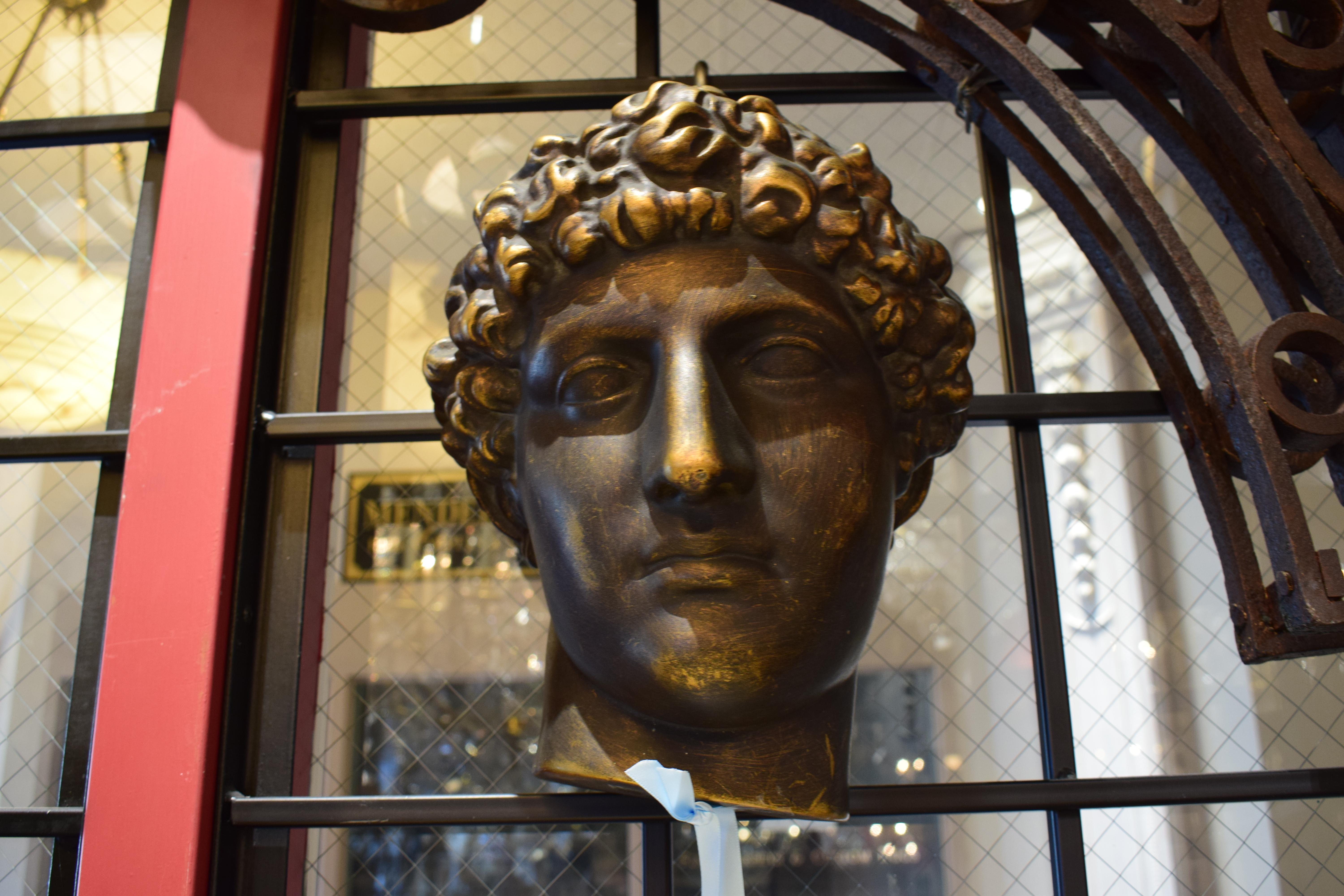 A fine sculpture of Apollo, ceramic with a metal like finish.
Dimensions: Height 12
