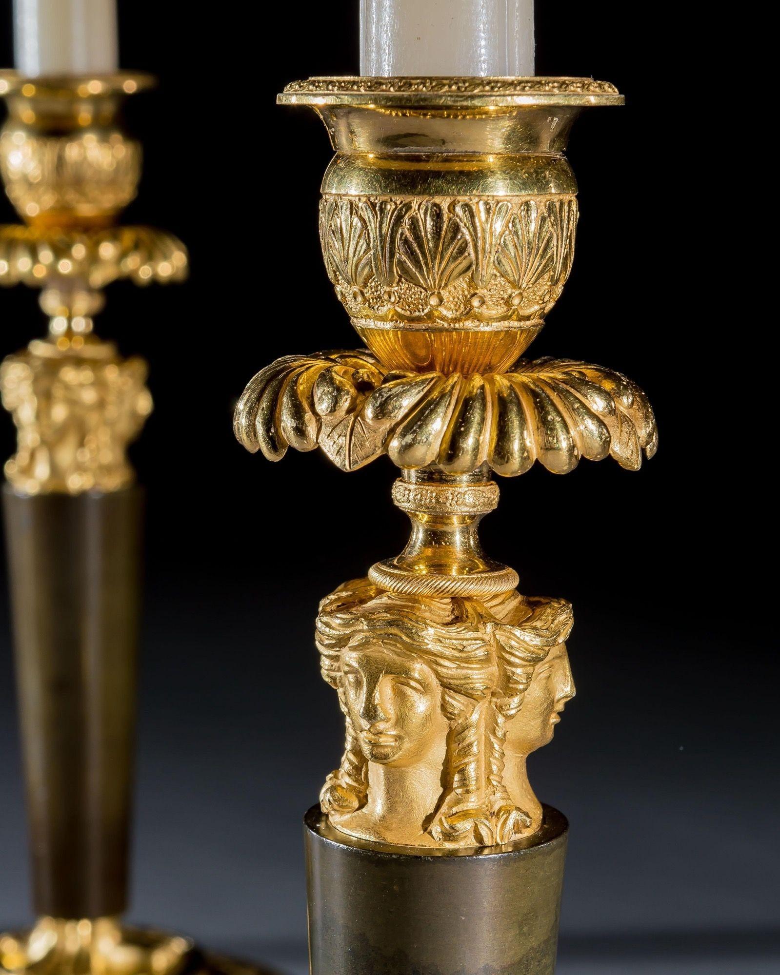 Fino juego de cuatro candelabros imperio de Claude Galle Francés en venta