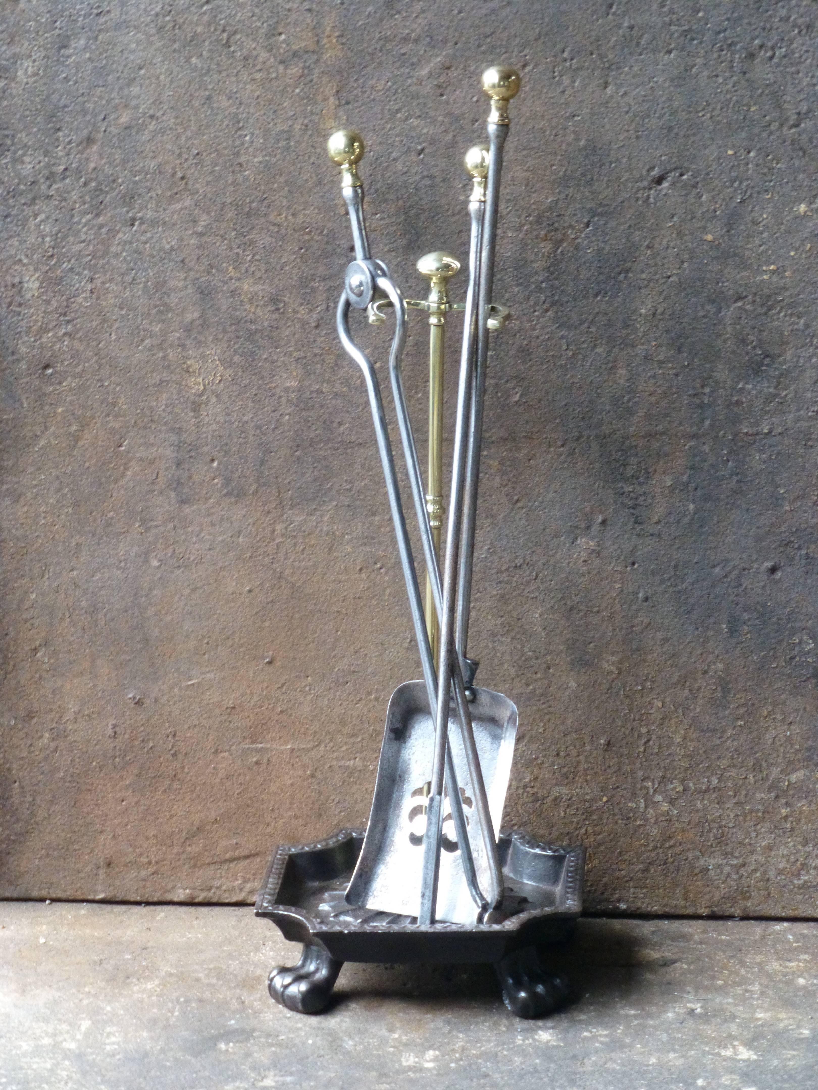 19th century English fireplace tool set, fire irons made of polished steel and polished brass. The style is Victorian and it is from that period. The condition is good.

