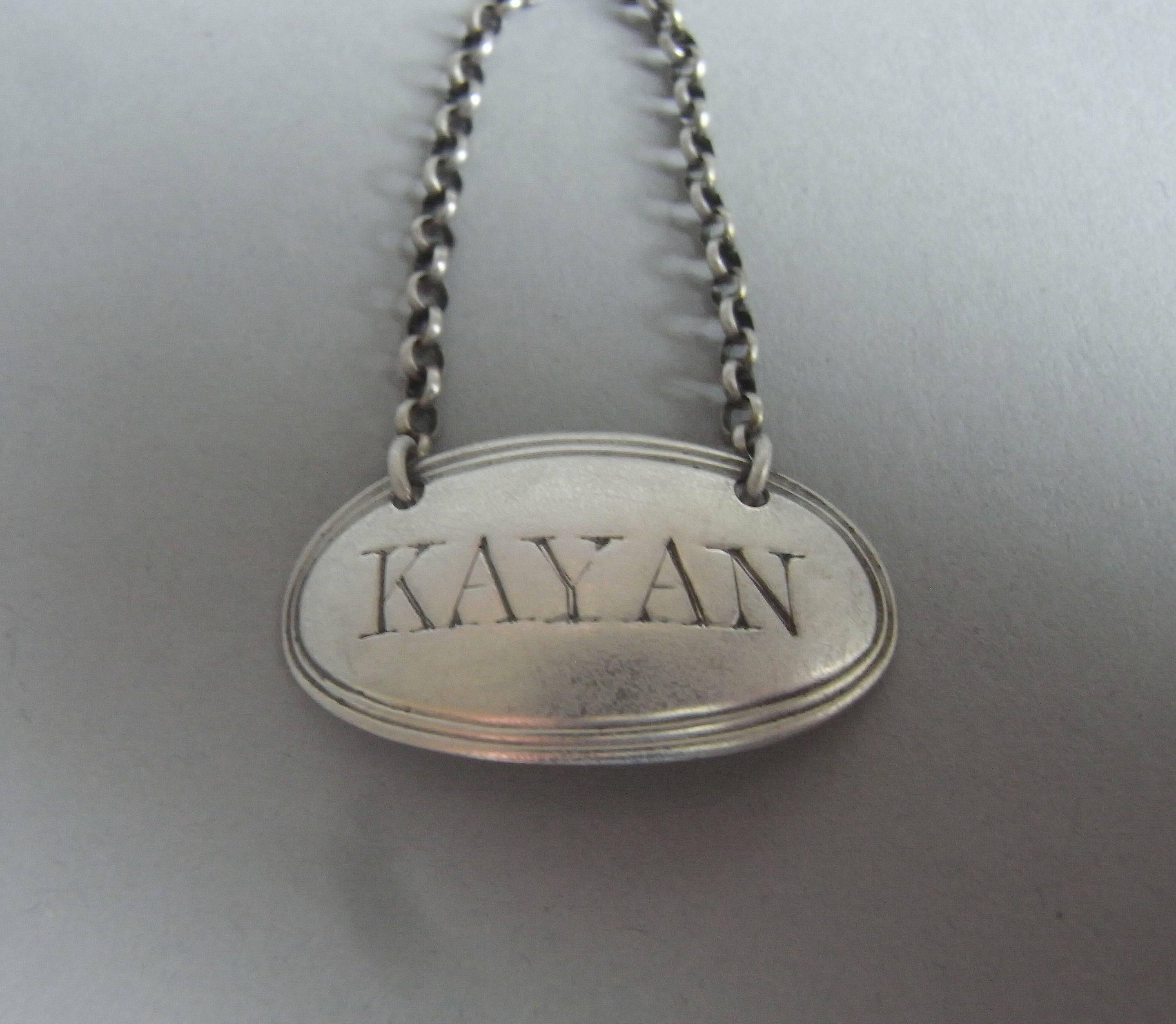 The labels have an oval rounded form and double thread edge. The set are engraved for KAYAN, SOY & KETCHUP. Each is fully marked and in excellent condition. 

Measures: Length: 1.1 inches, 2.75 cm.