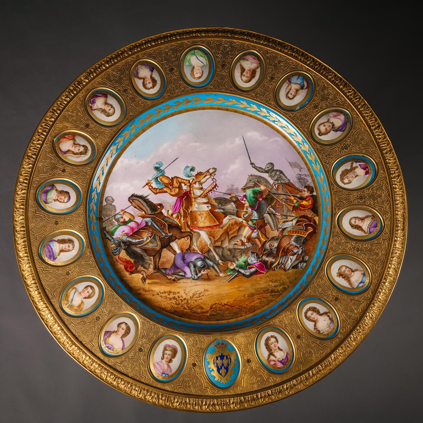 Table de centre ébonisée montée en porcelaine et bronze doré, de style Sèvres

La partie supérieure est ornée d'une plaque centrale à fond turquoise représentant François Ier (1494-1547) à la bataille de Pavie, signée 