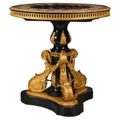 A Fine Sèvres-Style Porcelain and Gilt-Bronze Mounted Ebonised Centre Table
