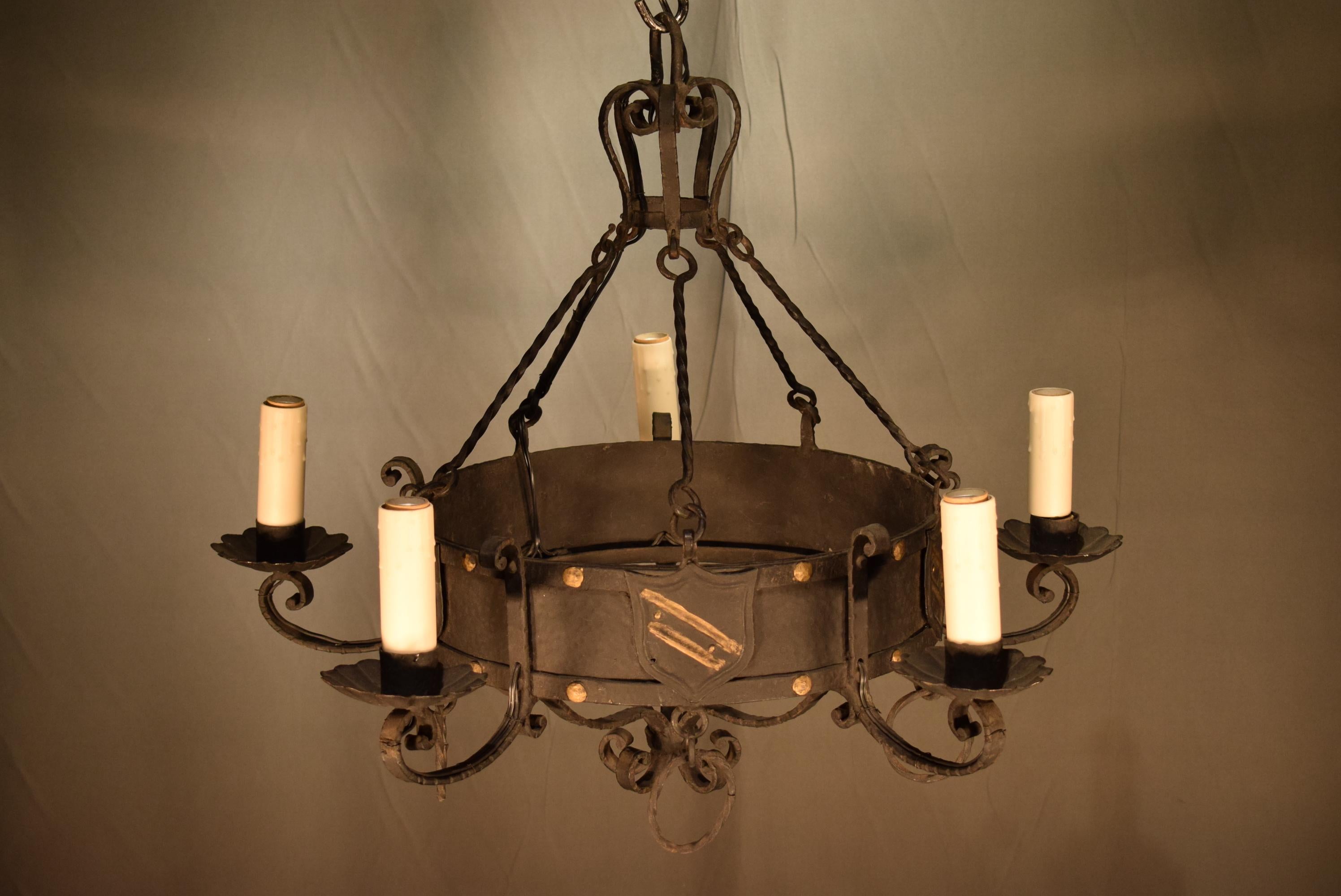 A fine Tudor style iron chandelier, France, circa 1940
5 lights
Dimensions: Height 24