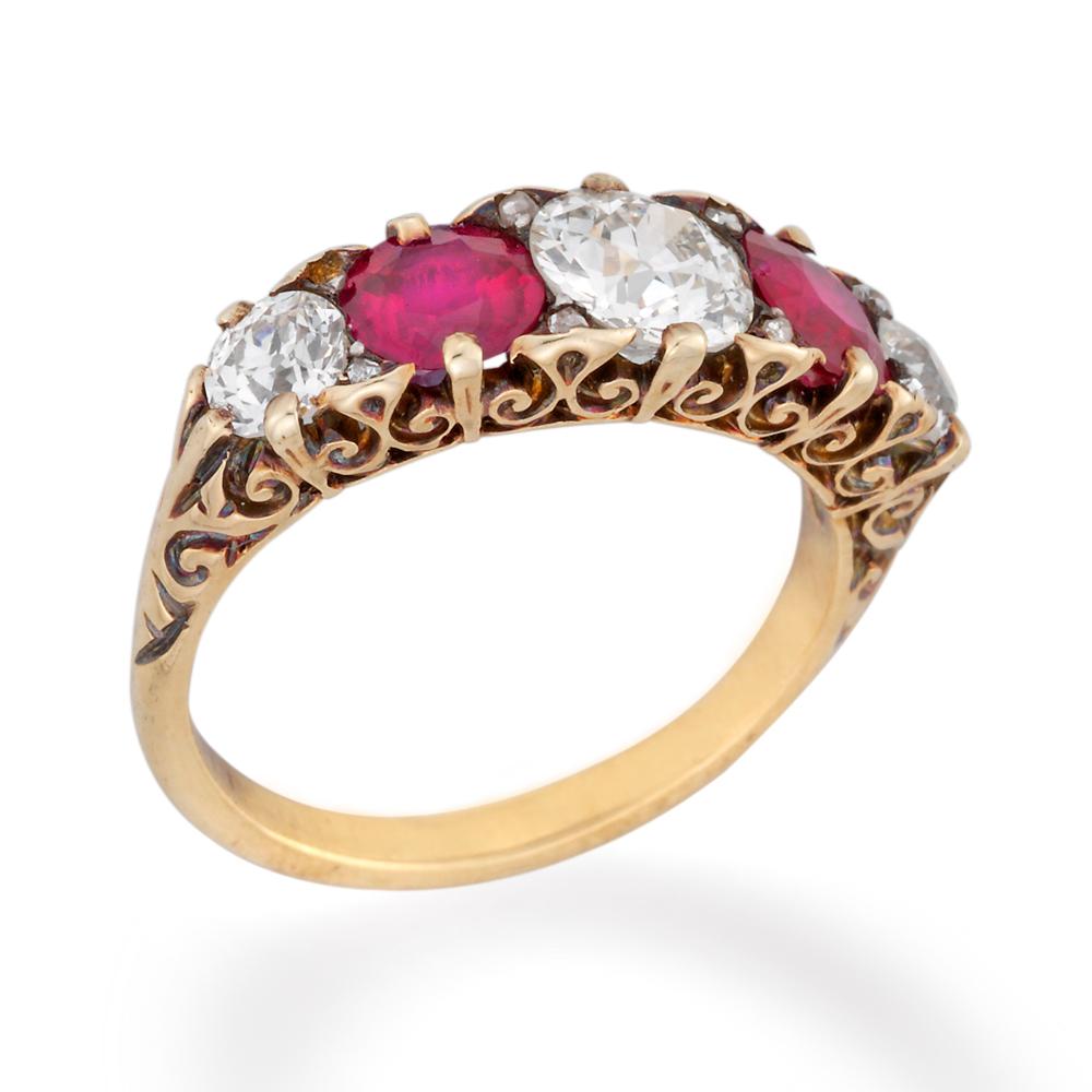 A fine Victorian five-stone ruby and diamond ring, the ring alternately-set with three old brilliant-cut diamonds and two round-shaped faceted rubies, the diamonds estimated to weigh a total of 1.50 carats, the rubies estimated to weigh a total of