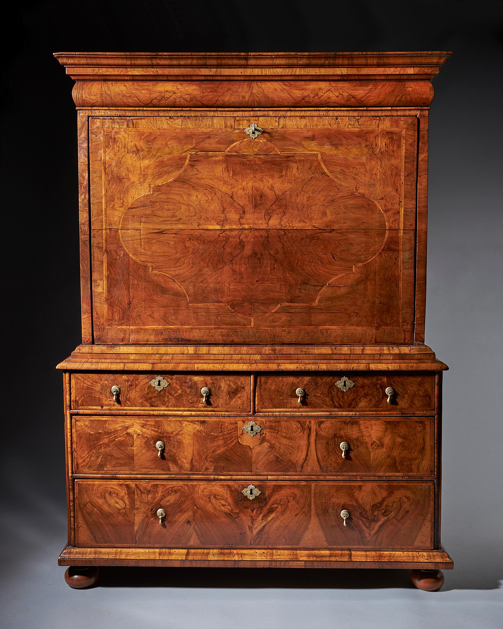 A fine William and Mary period figured walnut escritoire, concealing eight secret drawers, circa 1690-1700

The eight secret drawers are most entertaining, hidden in various ways throughout the interior. 

A superb and rare William & Mary walnut